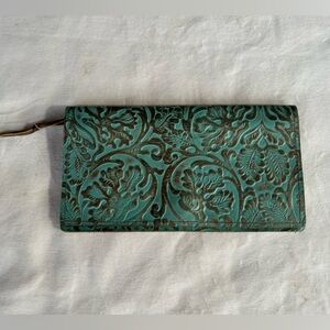 Turquoise leather tooled clutch